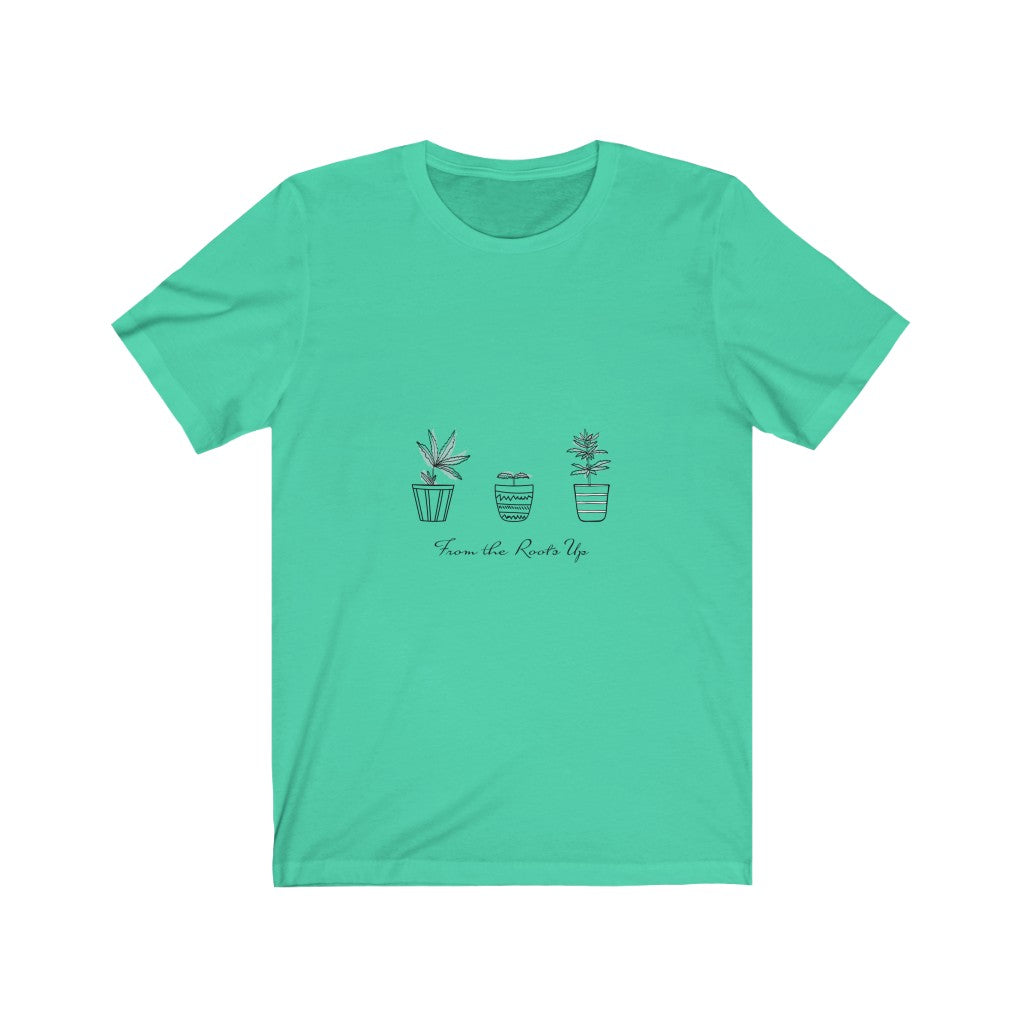 Mint green tee featuring three potted plants and the phrase "From the Roots Up" in a stylish font.