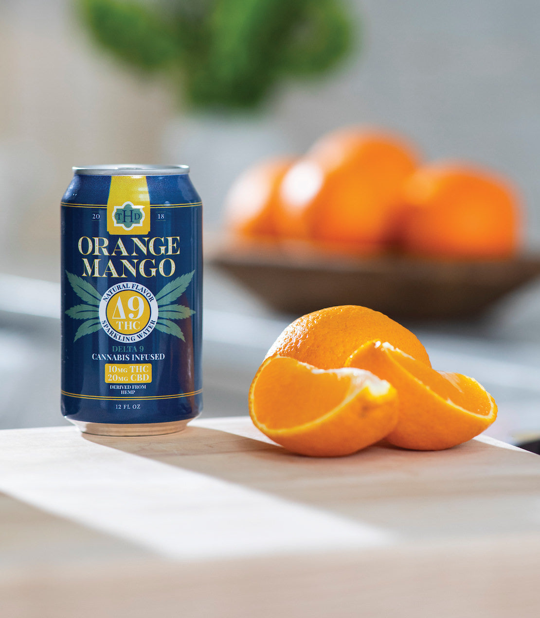 Orange Mango natural flavor sparkling water. Delta 9 cannabis infused. 10 mg THC and 20 mg CBD.