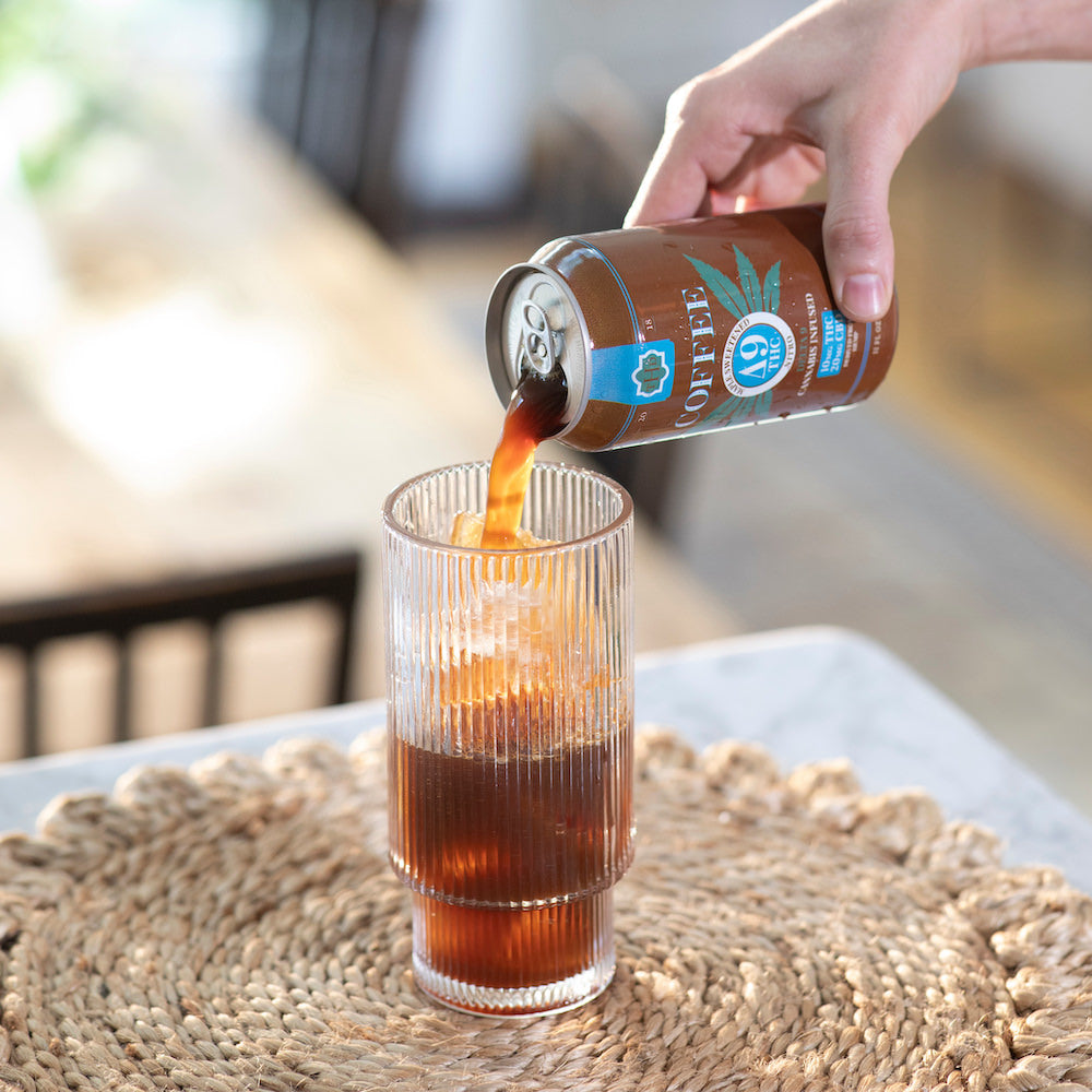 Delta 9 coffee can pouring into a glass.